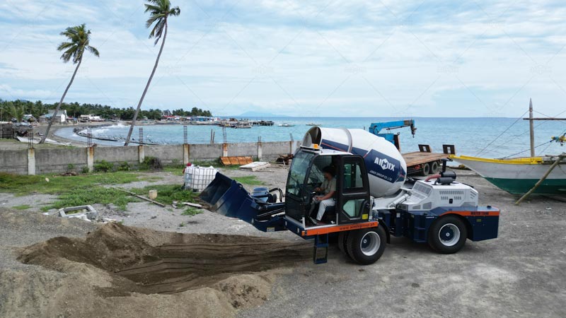 Self-loading concrete mixer for construction projects along the coast